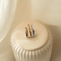 Gedrehter Ring aus Gold, Silber oder Messing