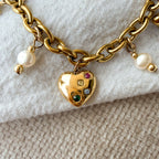 Herz-Charm des Amelie Bettelarmbands mit bunten Zirkonia und vergoldeter Edelstahlkette